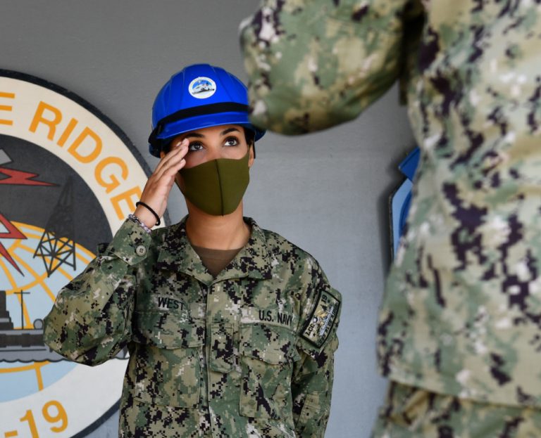 Orlando Native stands Messenger of the Watch on quarterdeck aboard U.S. Navy warship
